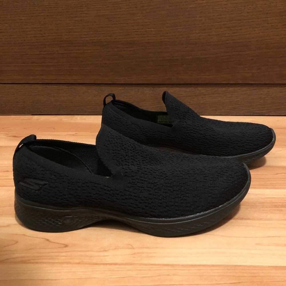 Skechers all black slip ons